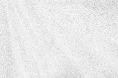 Beyaz, temiz yün dokusu arka planda. hafif doğal koyun yünü. Beyaz, pürüzsüz pamuk. Tasarımcılar için tüylü kürk dokusu. yakın plan beyaz yün halı.