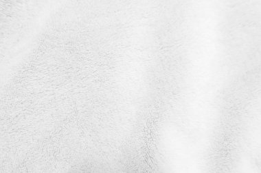 White clean wool texture background. light natural sheep wool. white seamless cotton. texture of fluffy fur for designers. close-up fragment white wool carpet.	