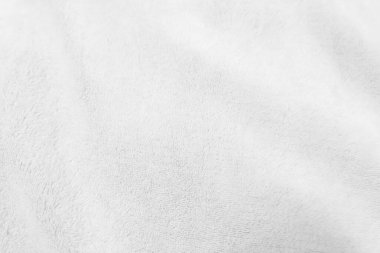 White clean wool texture background. light natural sheep wool. white seamless cotton. texture of fluffy fur for designers. close-up fragment white wool carpet.	