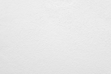 Beyaz beton duvarın pürüzsüz dokusu kaba bir yüzey, metin için boşluk, arkaplan için alan.