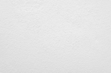 Seamless texture of white cement wall a rough surface, with space for text, for a background..	