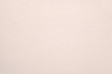 Seamless texture of pacific pink cement wall a rough surface, with space for text, for a background...	