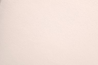 Seamless texture of pacific pink cement wall a rough surface, with space for text, for a background...	