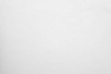Seamless texture of white cement wall a rough surface, with space for text, for a background..	