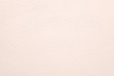 Seamless texture of pacific pink cement wall a rough surface, with space for text, for a background.	