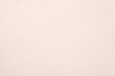 Seamless texture of pacific pink cement wall a rough surface, with space for text, for a background.	