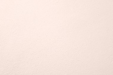 Seamless texture of pacific pink cement wall a rough surface, with space for text, for a background.	