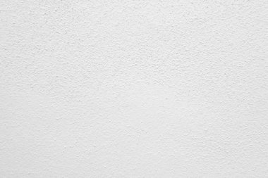 Seamless texture of white cement wall a rough surface, with space for text, for a background..	