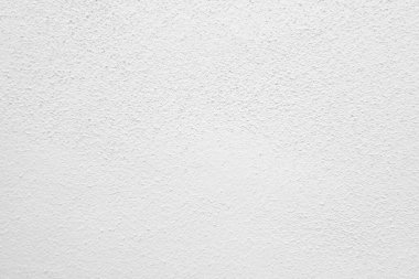 Beyaz beton duvarın pürüzsüz dokusu kaba bir yüzey, metin için boşluk, arkaplan için alan.