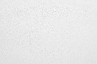 Beyaz beton duvarın pürüzsüz dokusu kaba bir yüzey, metin için boşluk, arkaplan için alan.