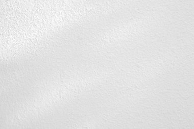 Seamless texture of white cement wall a rough surface, with space for text, for a background..	