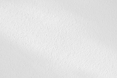 Seamless texture of white cement wall a rough surface, with space for text, for a background..	