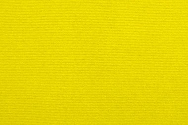 Yellow velvet fabric texture used as background. Empty yellow fabric background of soft and smooth textile material. There is space for text.	