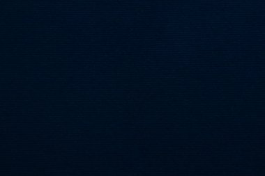 Dark blue velvet fabric texture used as background. Empty dark blue fabric background of soft and smooth textile material. There is space for text.	