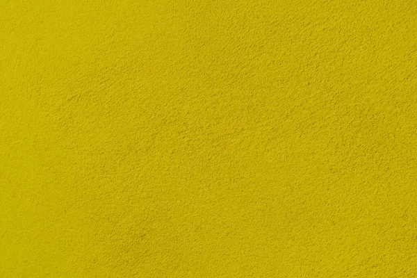 Seamless texture of yellow cement wall a rough surface, floor concrete, with space for text, for a background.	