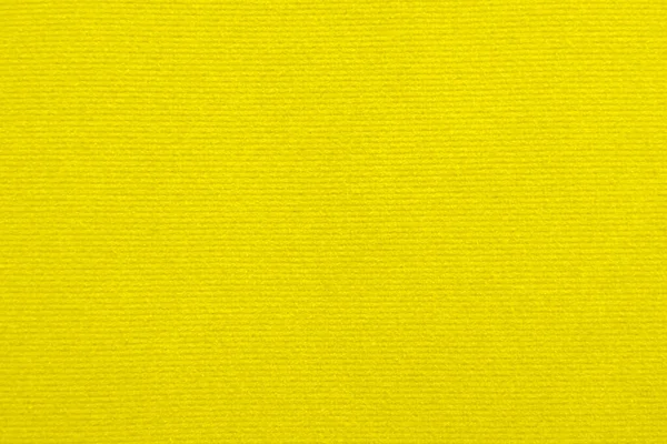 Yellow velvet fabric texture used as background. Empty yellow fabric background of soft and smooth textile material. There is space for text.	