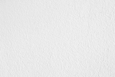 Seamless texture of white cement wall a rough surface, with space for text, for a background..	