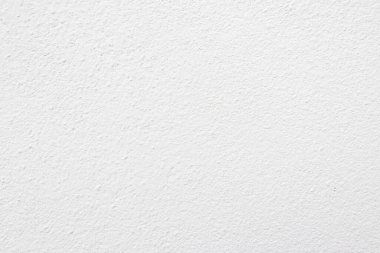 Beyaz beton duvarın pürüzsüz dokusu kaba bir yüzey, metin için boşluk, arkaplan için alan..