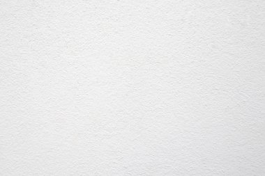Seamless texture of white cement wall a rough surface, with space for text, for a background..	