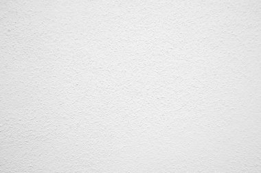 Beyaz beton duvarın pürüzsüz dokusu kaba bir yüzey, metin için boşluk, arkaplan için alan..