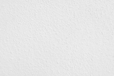 Beyaz beton duvarın pürüzsüz dokusu kaba bir yüzey, metin için boşluk, arkaplan için alan.