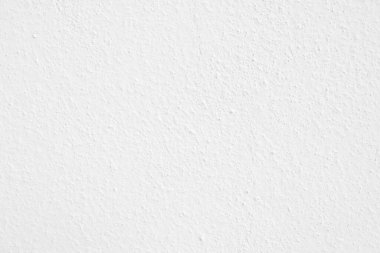 Beyaz beton duvarın pürüzsüz dokusu kaba bir yüzey, metin için boşluk, arkaplan için alan.
