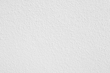 Beyaz beton duvarın pürüzsüz dokusu kaba bir yüzey, metin için boşluk, arkaplan için alan.