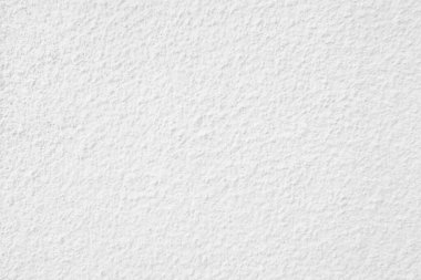 Beyaz beton duvarın pürüzsüz dokusu kaba bir yüzey, metin için boşluk, arkaplan için alan.