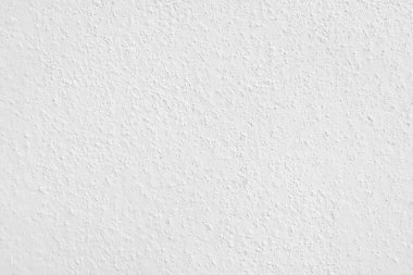 Beyaz beton duvarın pürüzsüz dokusu kaba bir yüzey, metin için boşluk, arkaplan için alan.