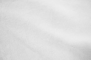 White clean wool texture background. light natural sheep wool. white seamless cotton. texture of fluffy fur for designers. close-up fragment white wool carpet.	