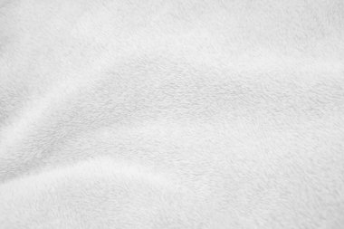 White clean wool texture background. light natural sheep wool. white seamless cotton. texture of fluffy fur for designers. close-up fragment white wool carpet.	