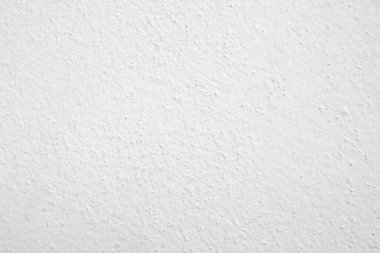 Seamless texture of white cement wall a rough surface, with space for text, for a background..	