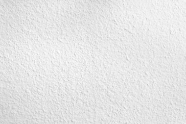 Beyaz beton duvarın pürüzsüz dokusu kaba bir yüzey, metin için boşluk, arkaplan için alan.