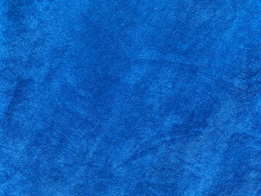 Arka plan olarak kullanılan açık mavi kadife kumaş dokusu. Yumuşak ve pürüzsüz tekstil malzemelerinin açık mavi kumaş arka planı. Metin için boşluk var.