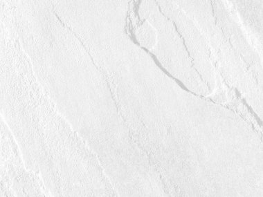 Beyaz taş dokusunun yüzeyi pürüzlü, gri-beyaz tonda. Duvar kağıdı veya arkaplan resmi için bunu kullanın. Metin için boş bir boşluk var