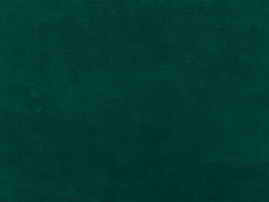 Dark green old velvet fabric texture used as background. Empty green fabric background of soft and smooth textile material. There is space for text..	