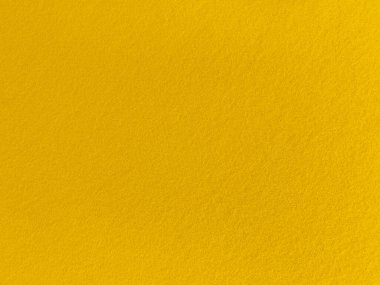 Felt yellow soft rough textile material background texture close up,poker table,tennis ball,table cloth. Empty yellow  fabric background.	
