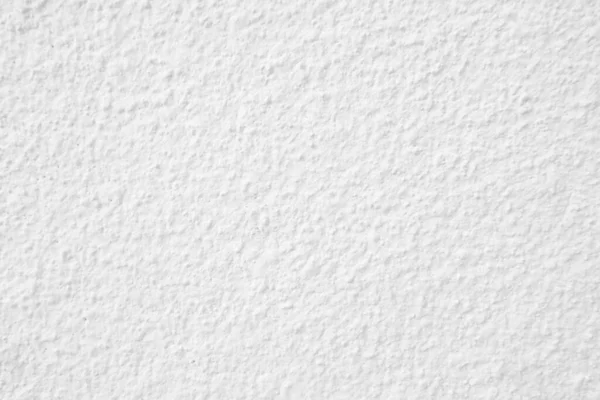 Beyaz beton duvarın pürüzsüz dokusu kaba bir yüzey, metin için boşluk, arkaplan için alan.