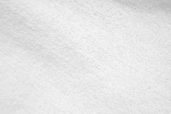 White clean wool texture background. light natural sheep wool. white seamless cotton. texture of fluffy fur for designers. close-up fragment white wool carpet.	