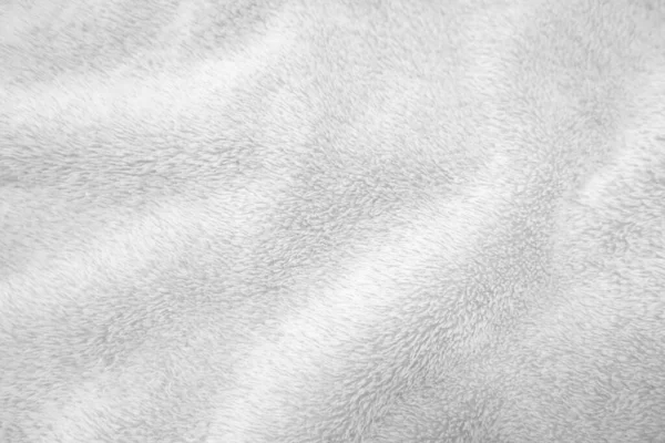 White clean wool texture background. light natural sheep wool. white seamless cotton. texture of fluffy fur for designers. close-up fragment white wool carpet.	