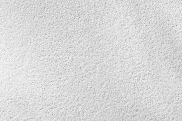 Beyaz beton duvarın pürüzsüz dokusu kaba bir yüzey, metin için boşluk, arkaplan için alan.