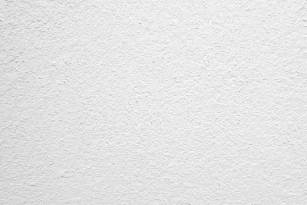 Beyaz beton duvarın pürüzsüz dokusu kaba bir yüzey, metin için boşluk, arkaplan için alan.