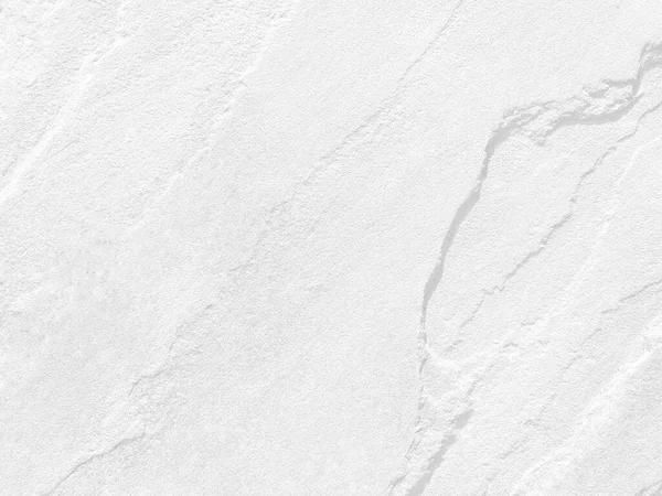 Beyaz taş dokusunun yüzeyi pürüzlü, gri-beyaz tonda. Duvar kağıdı veya arkaplan resmi için bunu kullanın. Metin için boş bir boşluk var