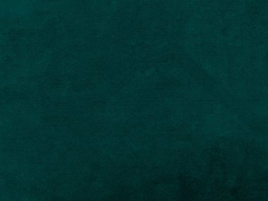 Dark green old velvet fabric texture used as background. Empty green fabric background of soft and smooth textile material. There is space for text..	