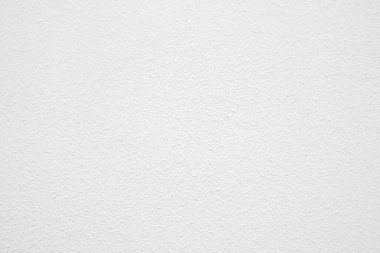 Seamless texture of white cement wall a rough surface, with space for text, for a background..	