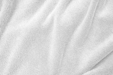 Beyaz, temiz yün dokusu arka planda. hafif doğal koyun yünü. Beyaz, pürüzsüz pamuk. Tasarımcılar için tüylü kürk dokusu. yakın plan beyaz yün halı..