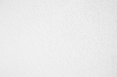 Seamless texture of white cement wall a rough surface, with space for text, for a background..	