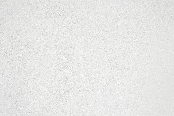 Seamless texture of white cement wall a rough surface, with space for text, for a background..	