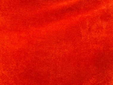Orange velvet fabric texture used as background. Empty Orange fabric background of soft and smooth textile material. There is space for text.	