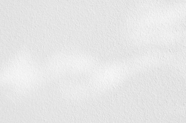 Seamless texture of white cement wall a rough surface, with space for text, for a background..	